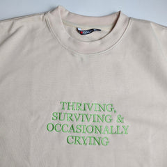 THRIVING, SURVIVING & OCCASIONALLY CRYING Embroidered Sweatshirt