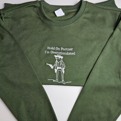 Hold On Partner, I'm Overstimulated Embroidered Sweatshirt