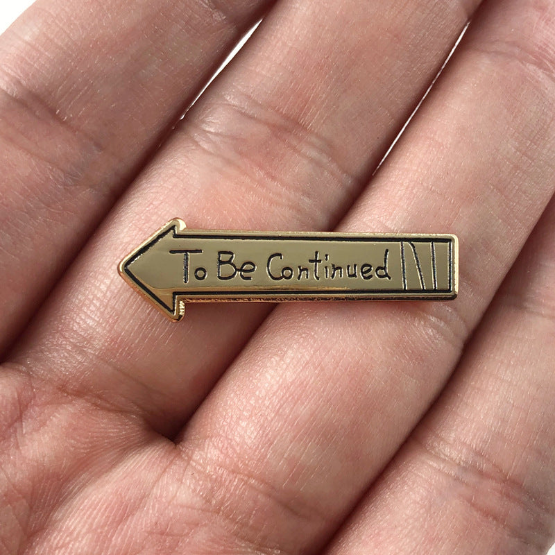 JOJO To Be Continued Badge Brooch