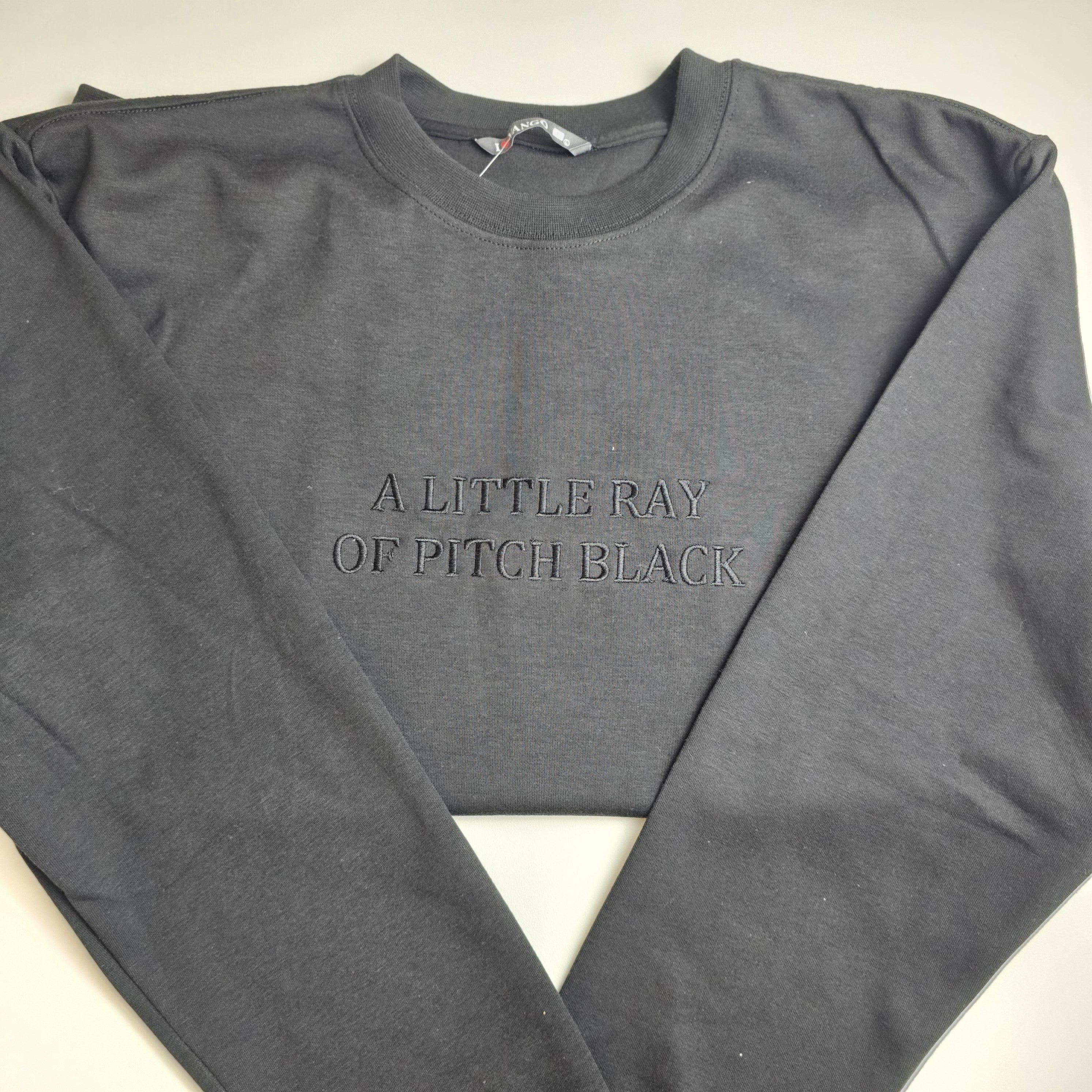 A LITTLE RAY OF PITCH BLACK Embroidered Sweatshirt